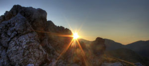 sunrising behind Rocky Mountains